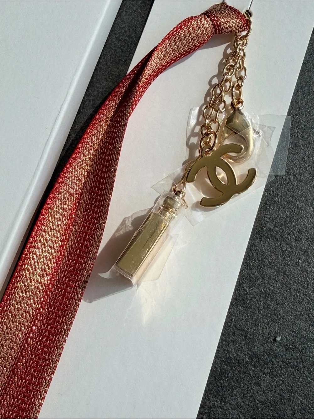 New CHANEL Novelty Gold CC & Perfume Bottle Charm with Red Ribbon